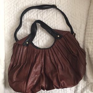 Brown leather bag with shoulder strap